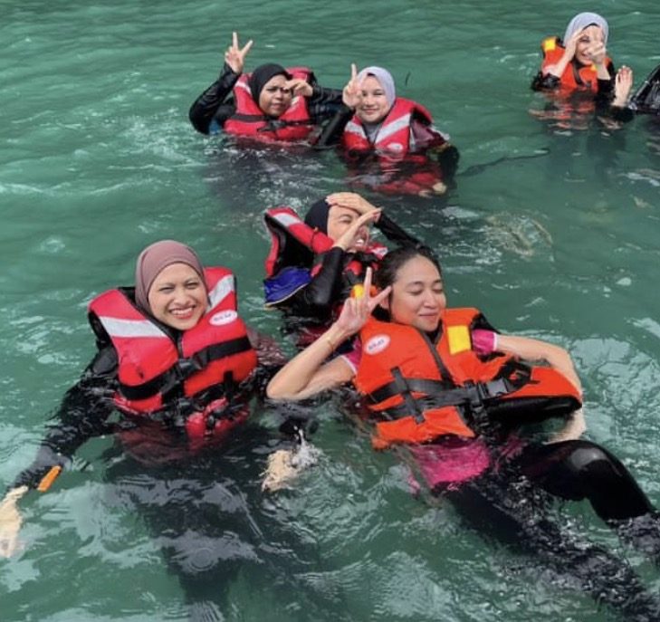 Calm turquoise Andaman Sea during peak snorkeling Langkawi season
